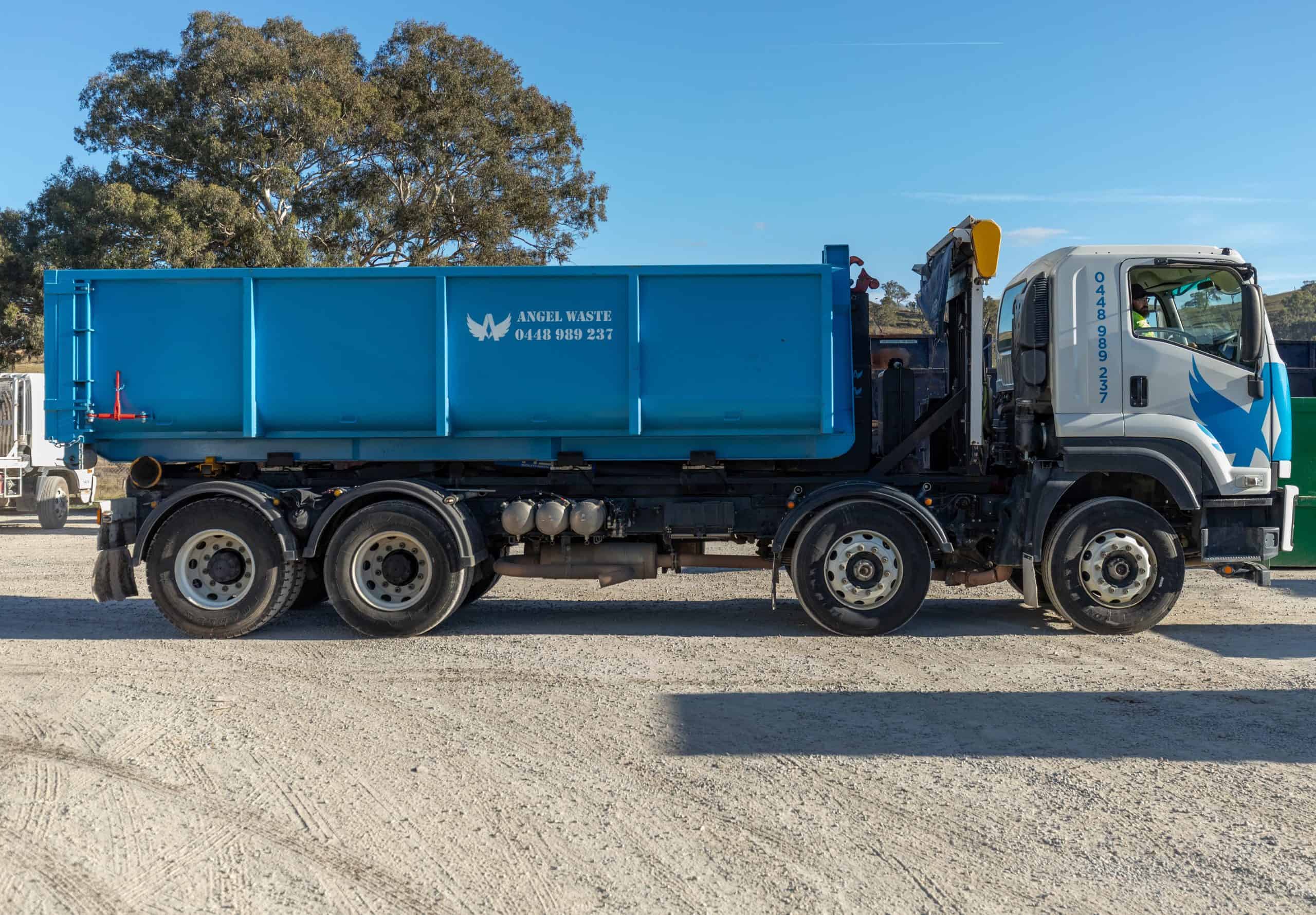 Angel Waste truck with Angel Waste skip bin
