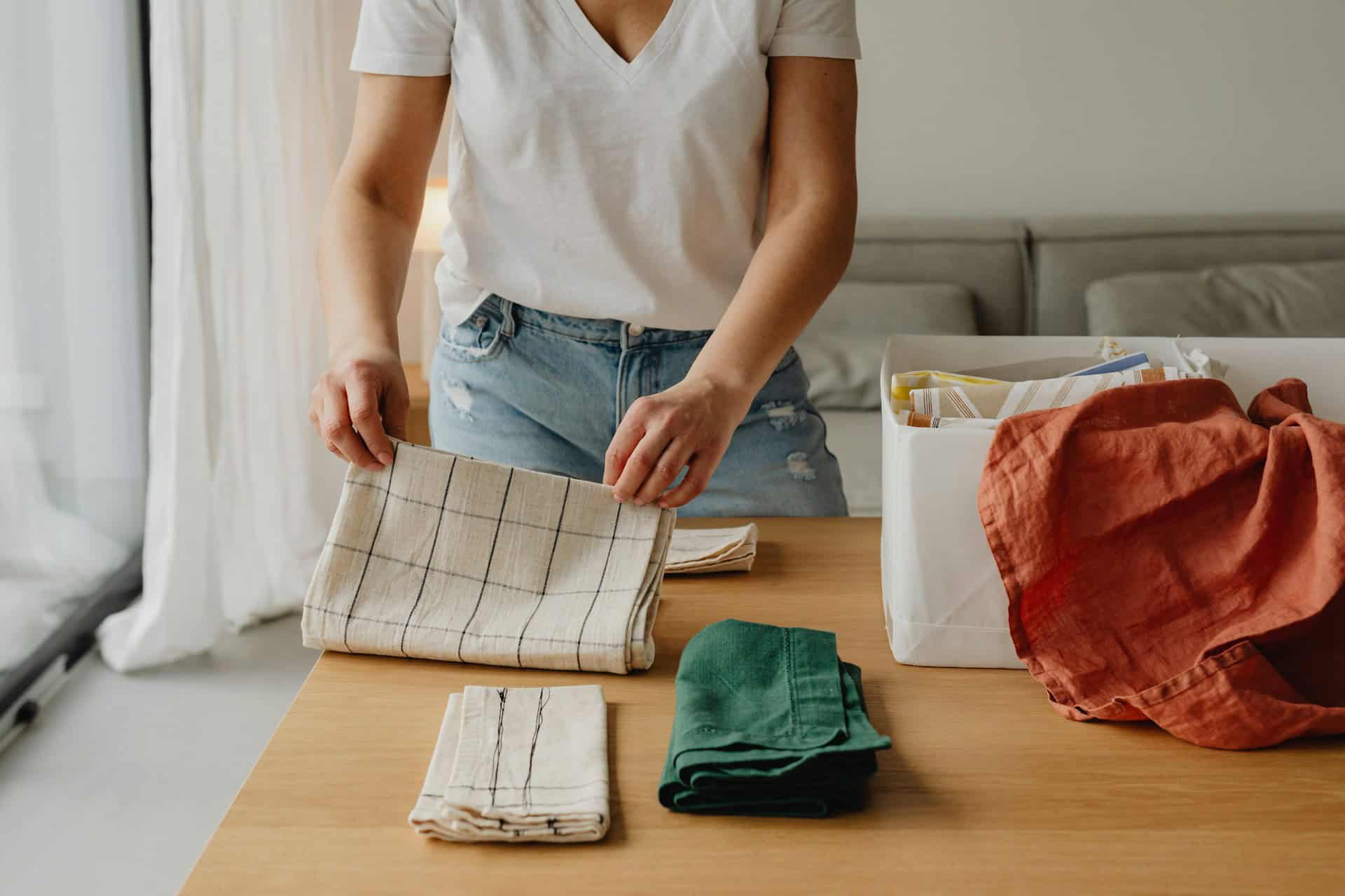 Woman folding linens